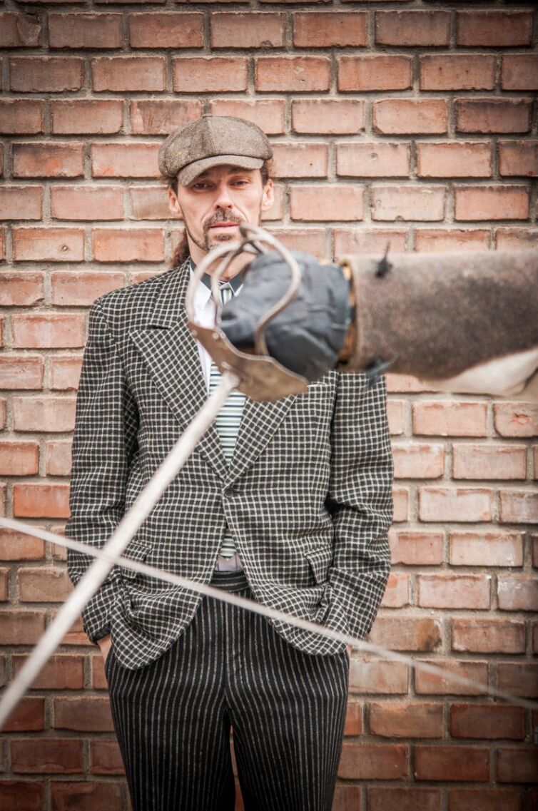 Pán v kostýmoch z 19-teho storočia, podujatie Menzúra, ktoré organizuje šermiarska skupina TOSTABUR